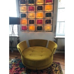 joli fauteuil fama trés coloré et bon état sur le site de l'occasion so chic so design
